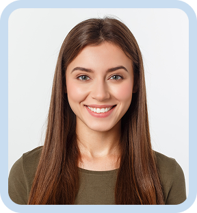 FamilySmiling young woman with long brown hair wearing an olive green shirt against a light background